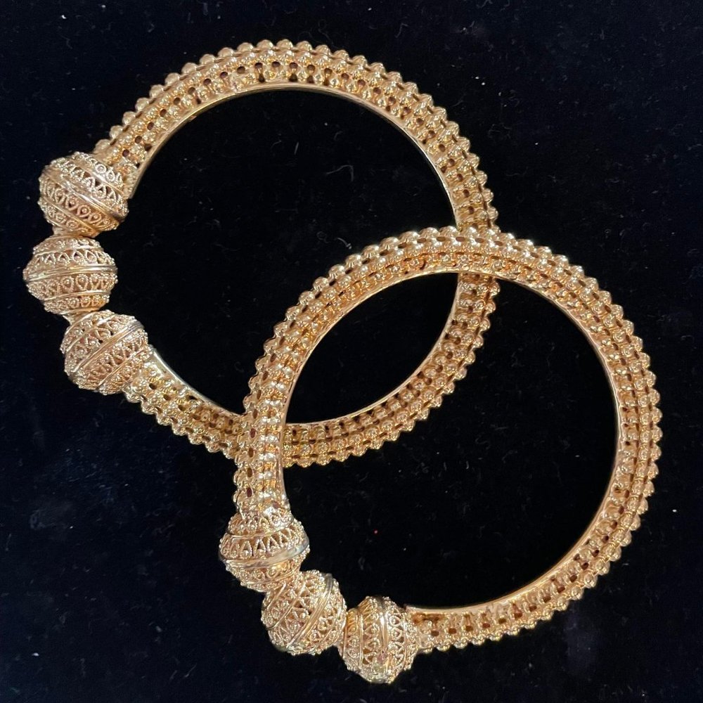 Pair of Indian gold-tone ball bangles